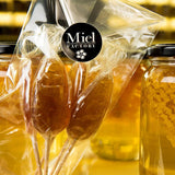 sucettes et miel en rayon